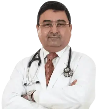 Dr. Vikas Gupta consulting with a patient