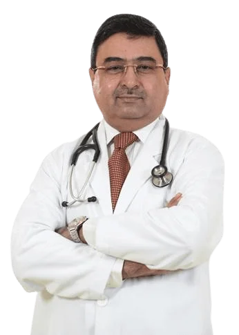 Dr. Vikas Gupta consulting with a patient